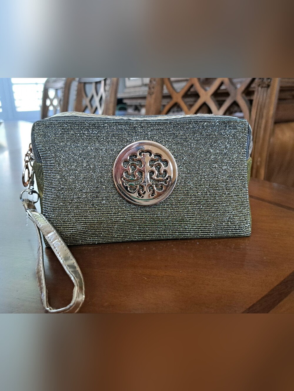 Glitter Cosmetic Bag features a wristlet strap